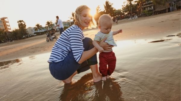mom and toddler on a beach