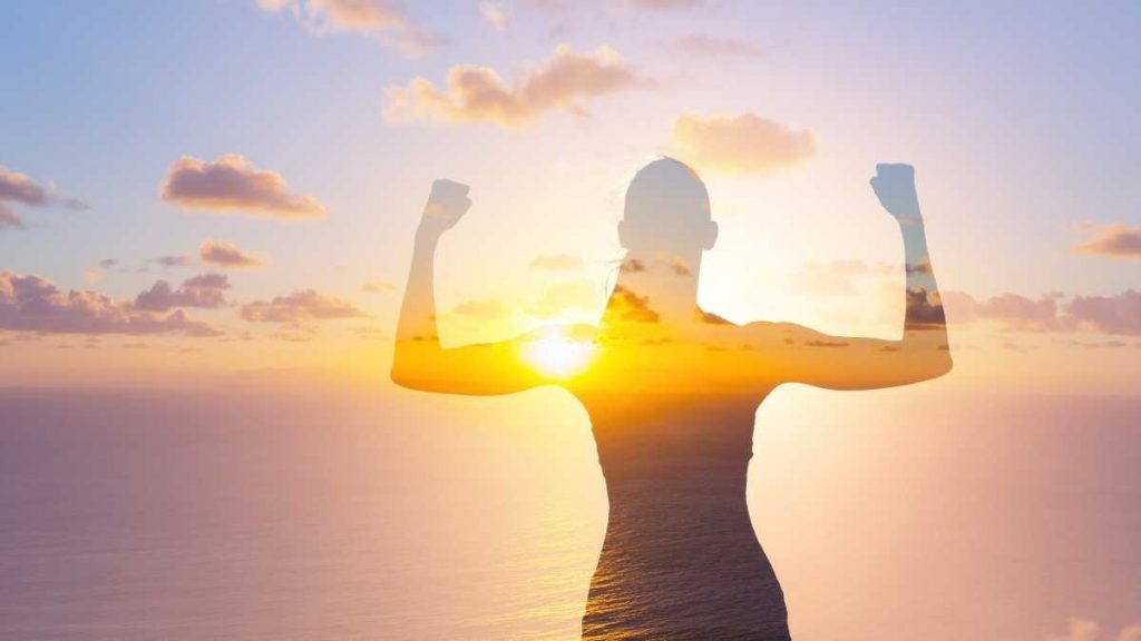 silhouette of mom on beach powerful