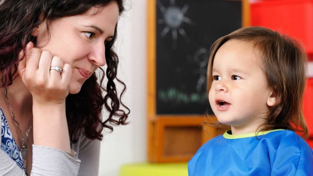 toddler interacting with mom