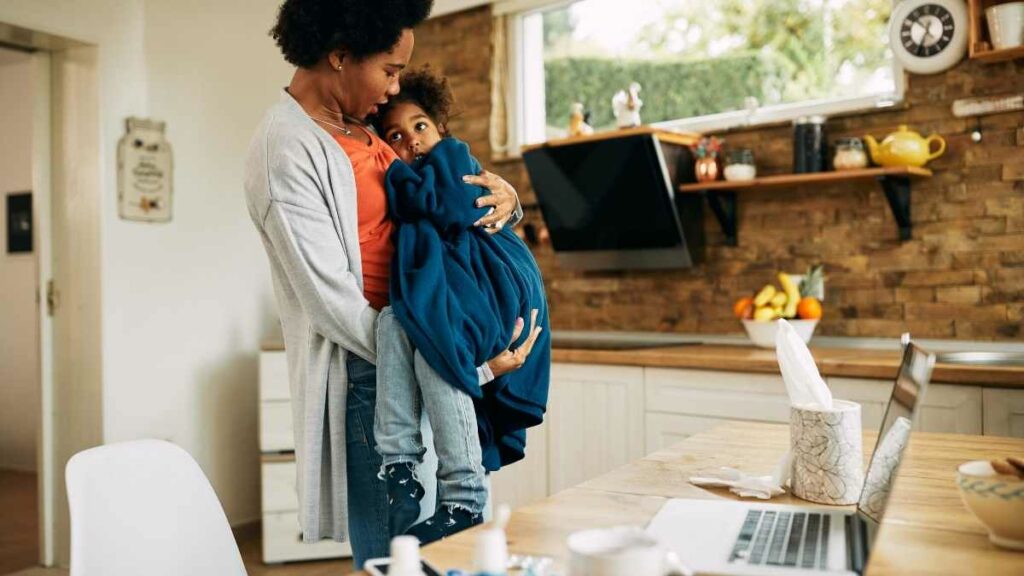 mom supporting child