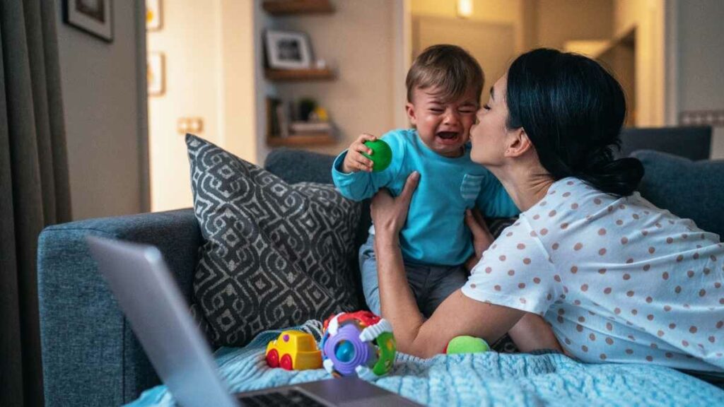 toddler crying with mom