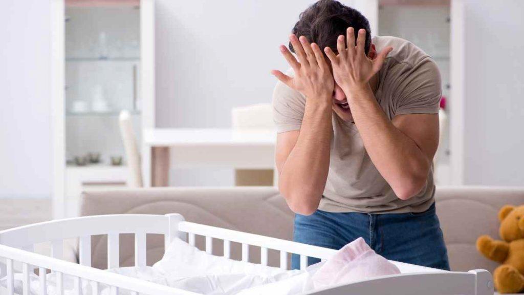 dad annoyed that baby will not sleep