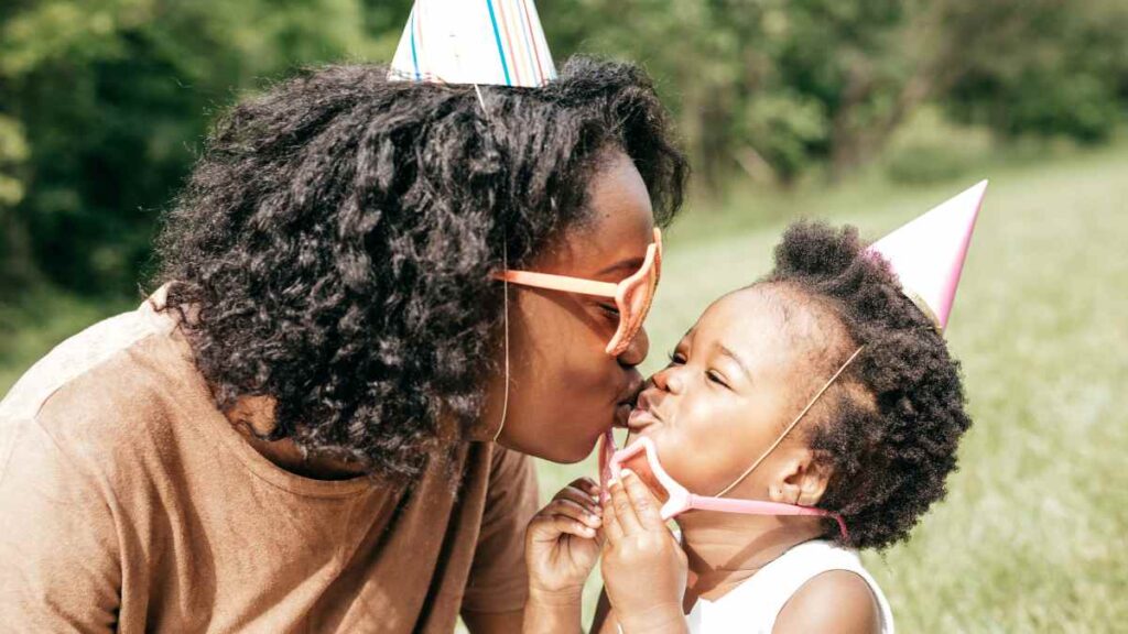 toddler and mom celebrating